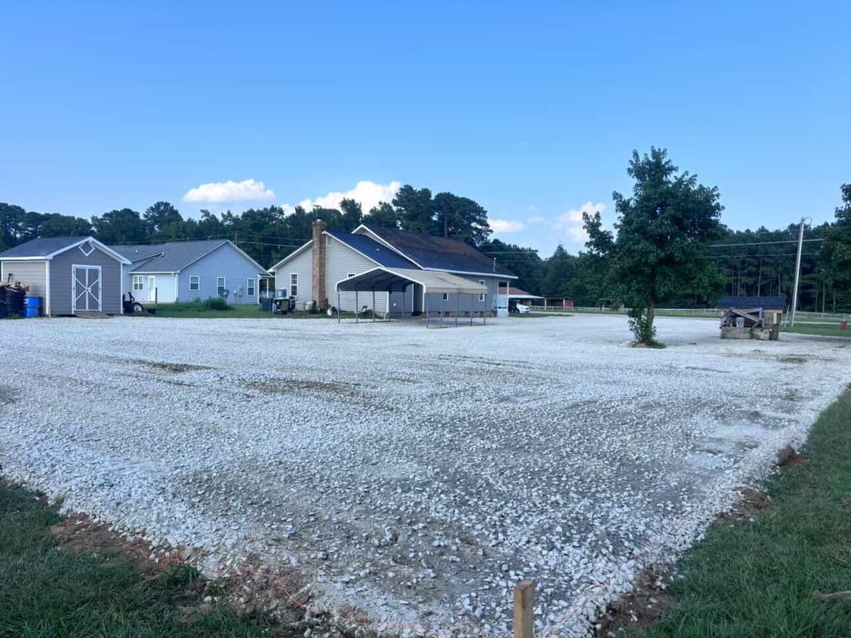 Wide finished gravel pad with clean access, Eastern North Carolina.